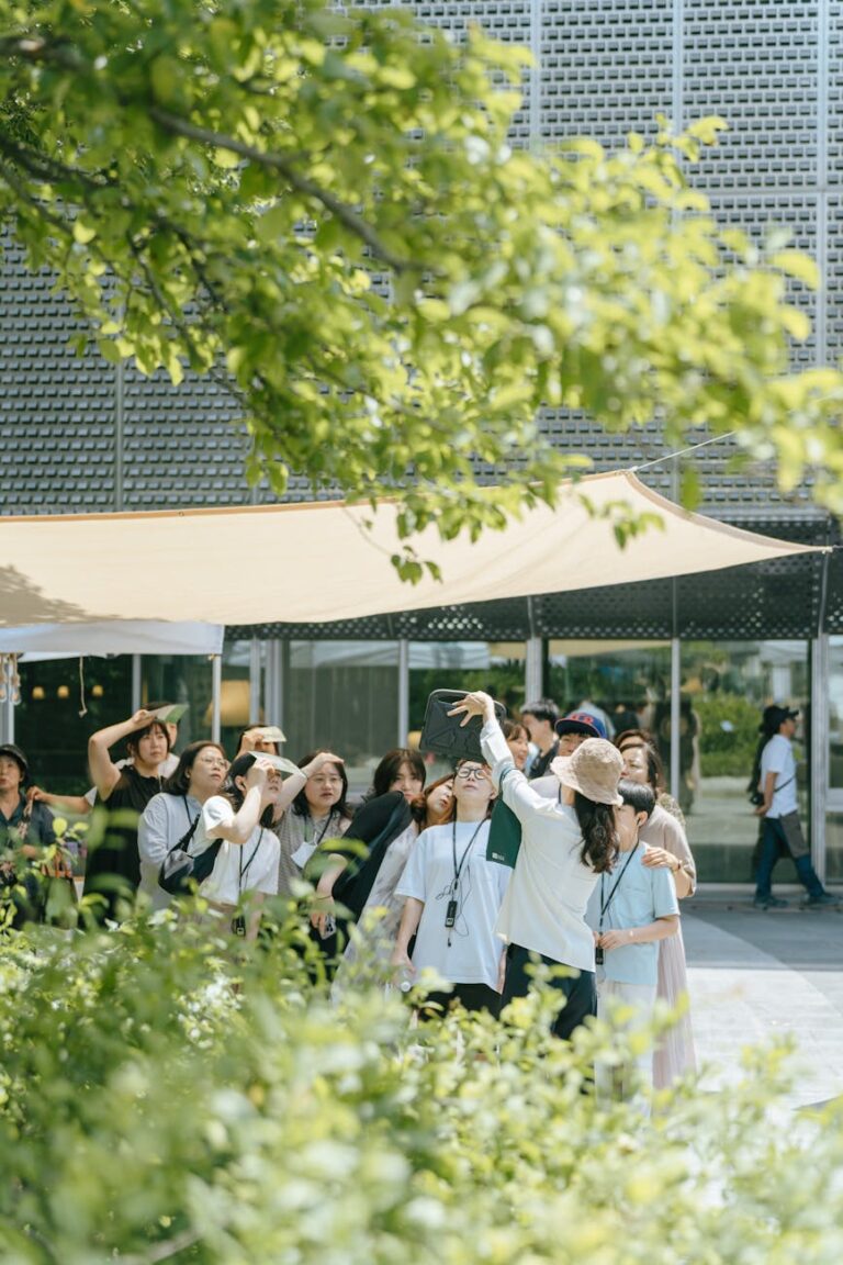 people standing near building in city