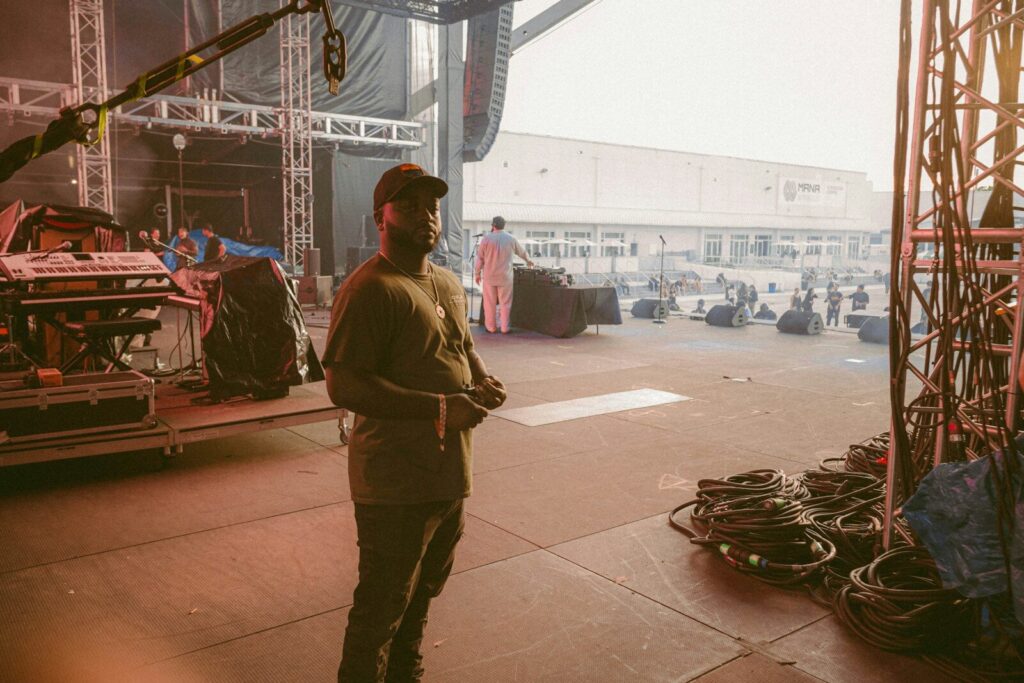 a man standing in front of a stage